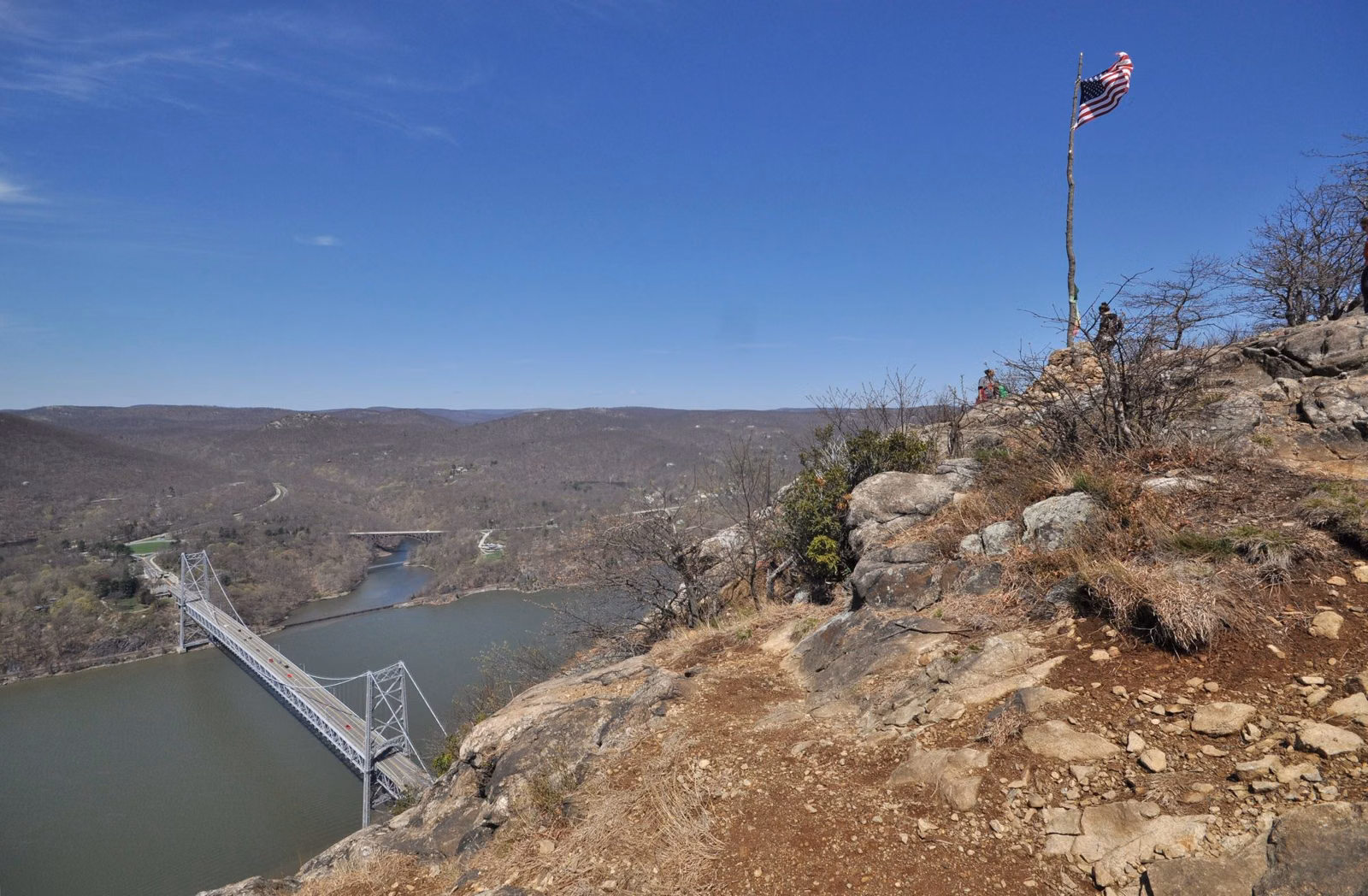 The Hudson River and Bear Mountain Bridge from the rocky summit of Anthony's Nose in early spring