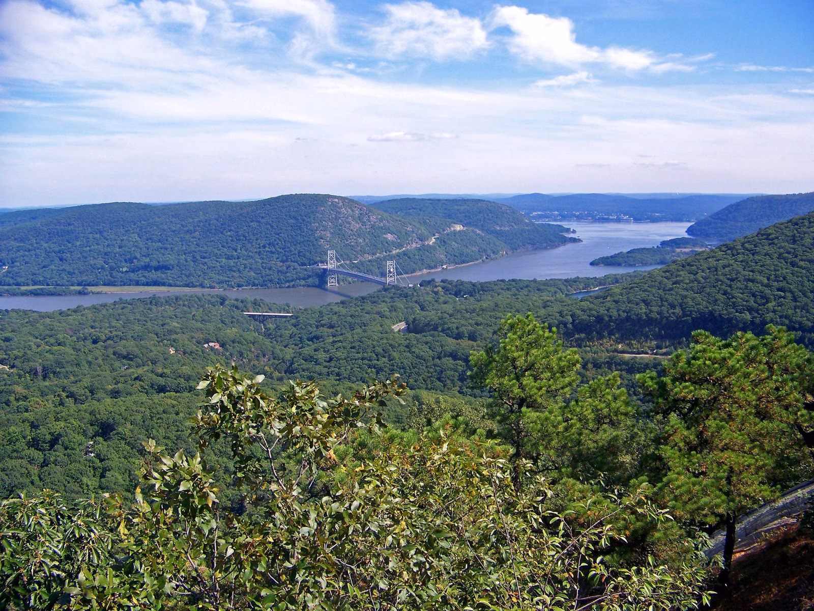 View east from Popolopen Torne over the Hudson River to the Bear Mountain Bridge and Anthony's Nose