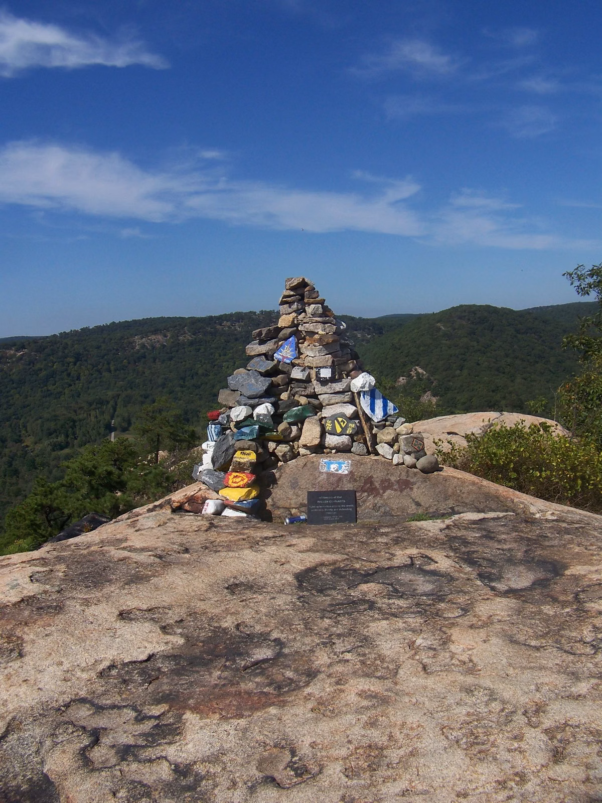 Stone cairn on the bare rock summit of Popolopen Torne